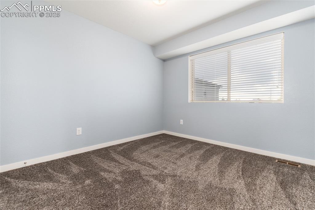 Image 23 of 33: 3rd bedroom