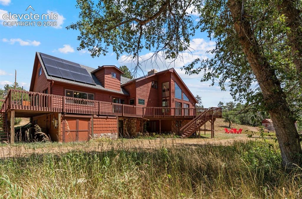 Image 1 of 49: Enchanted 6.5 acre horse property at the base of Mt. Chautauqua with a barn