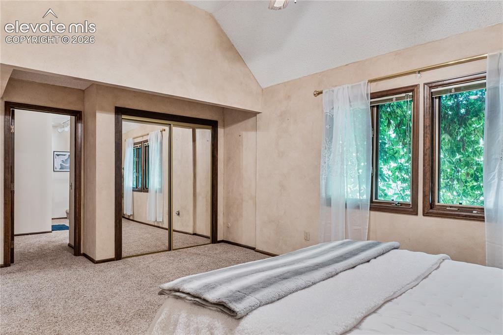 Image 14 of 49: Large closet + a HUGE walk-in closet in the Primary!