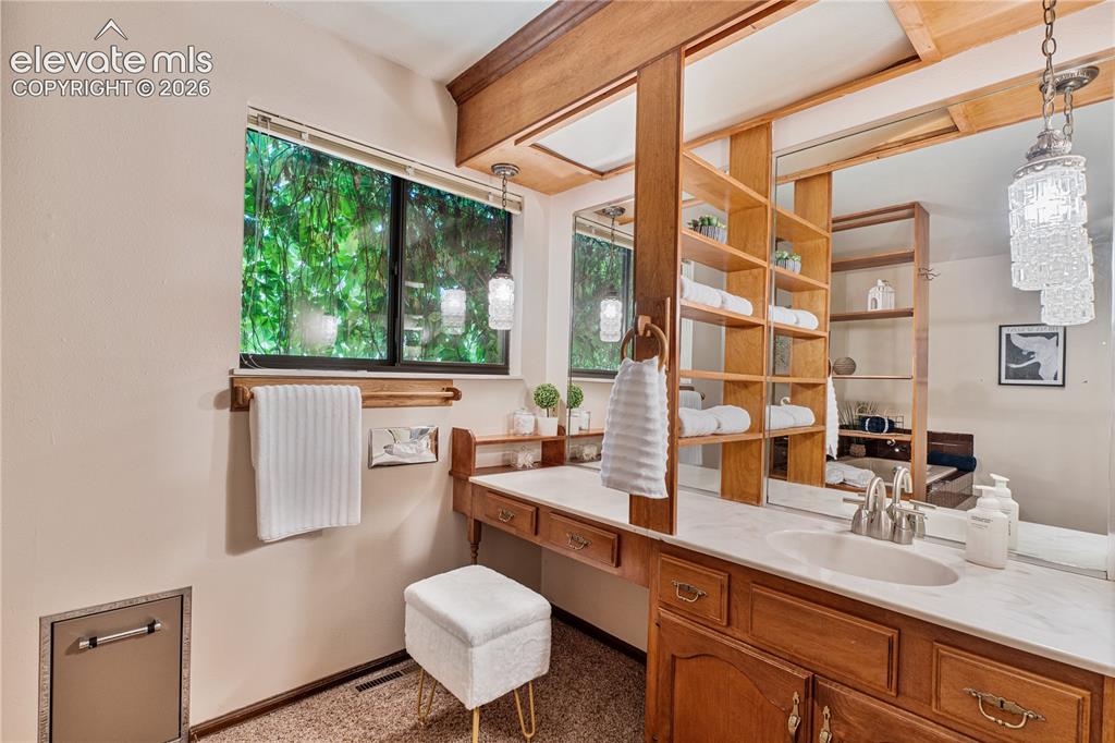 Image 15 of 49: This vintage en suite bathroom is one of our all-time favorite baths!