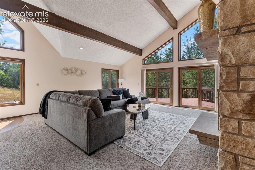 Image 5 of 49: Tall ceiling and beams, too!