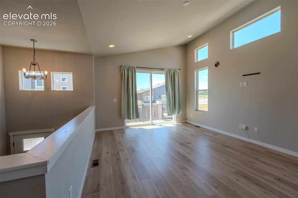 Image 12 of 46: Open floor plan with Living Room/Dining Room, great for entertaining.