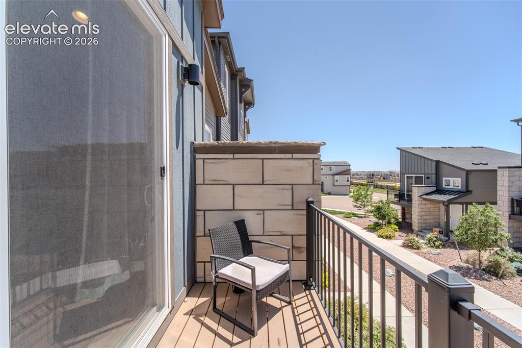 Image 14 of 46: Upper Level Balcony to enjoy the Colorado sunshine.