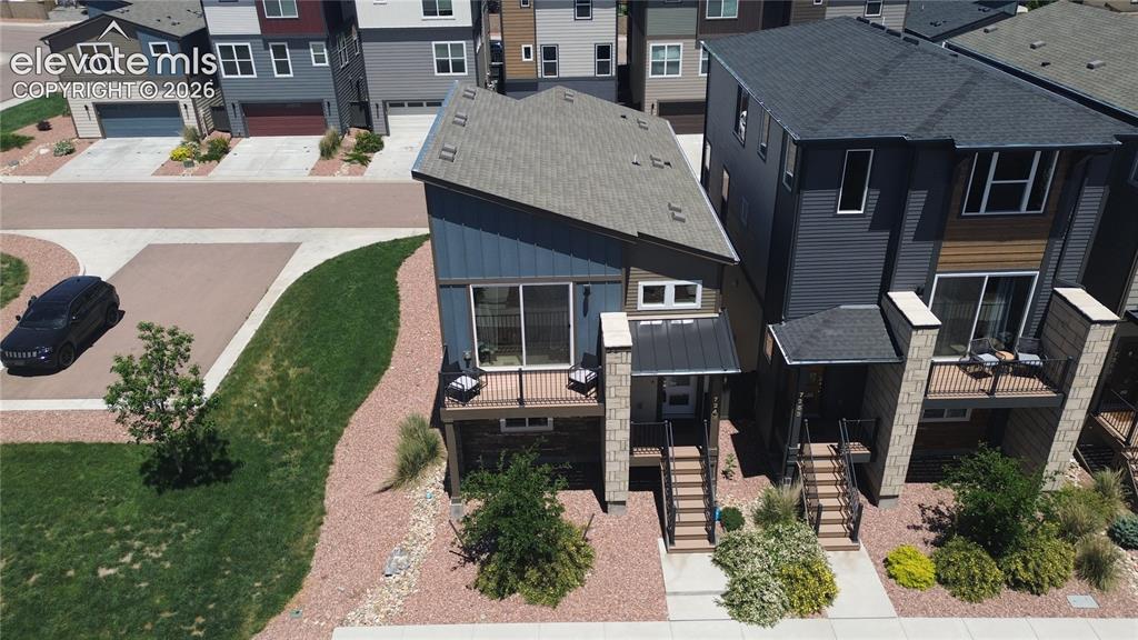 Image 3 of 46: Aerial front view of the home.