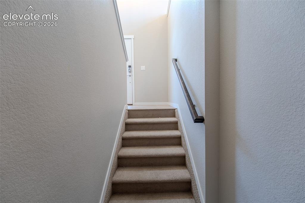Image 33 of 46: Stairs to the Lower Level.
