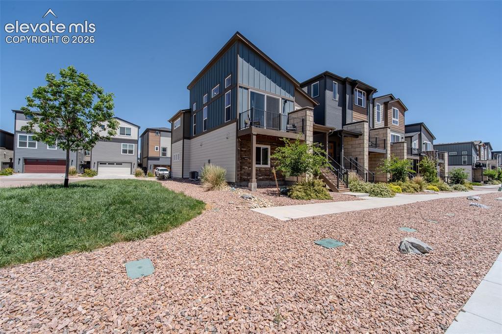 Image 6 of 46: This beautiful contemporary home sits on a corner lot.