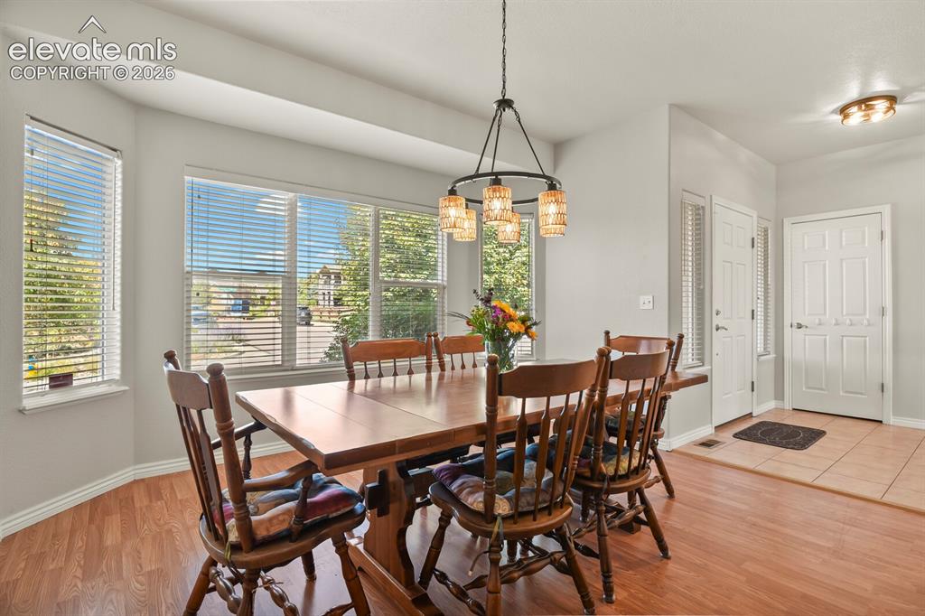 Image 5 of 50: Bay window in spacious Formal Dining Room