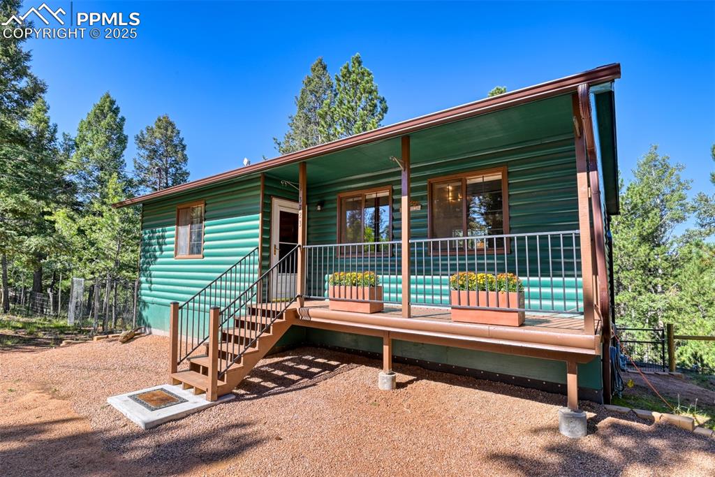 Caption: Sunny front porch entrance