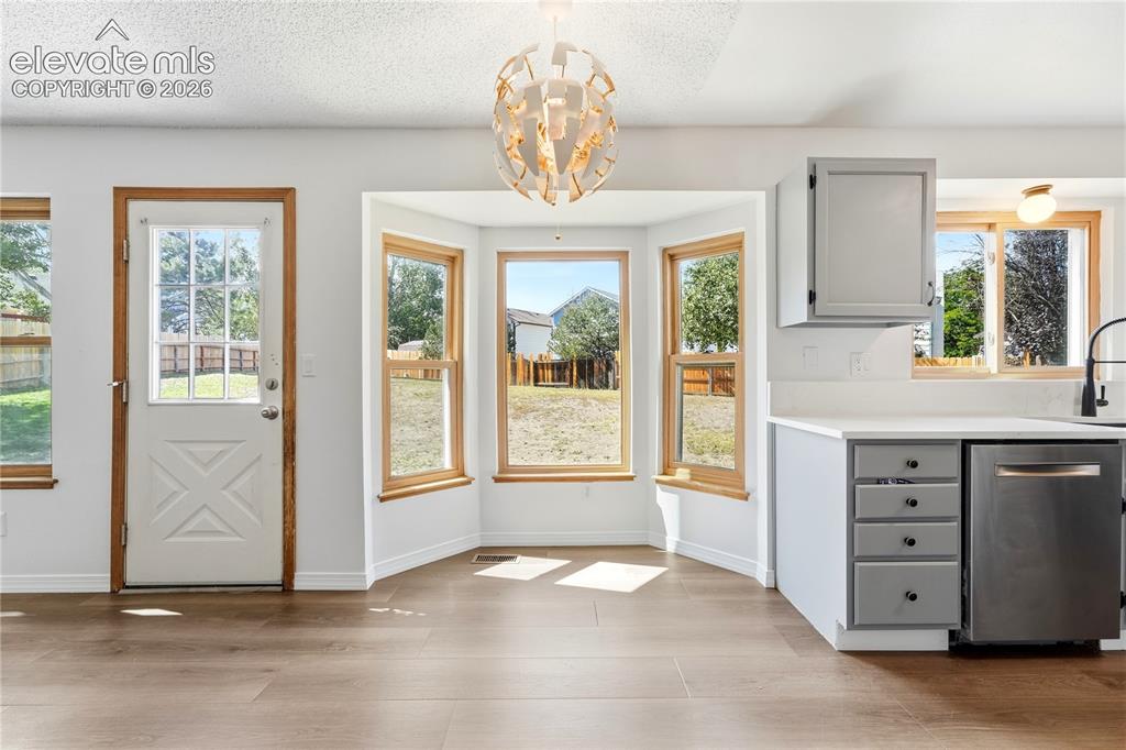 Image 6 of 47: Breakfast nook area with new LVP flooring