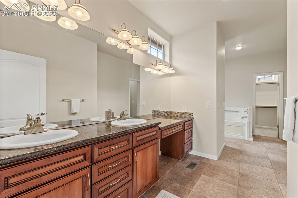 Image 23 of 39: Master Bathroom