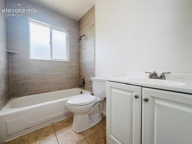 Image 10 of 20: Upper bath with new shower tile, new vanity, sink, and toilet