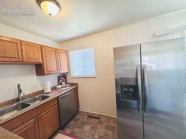 Image 5 of 20: New stainless steel appliances dishwasher, and window with blinds