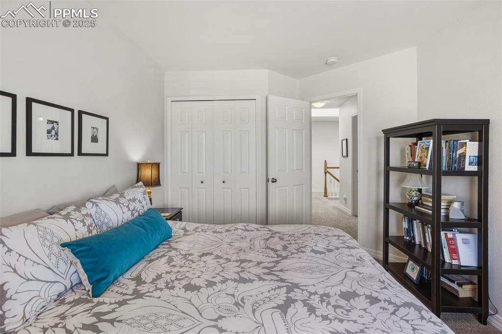 Image 30 of 43: Carpeted bedroom featuring a closet and baseboards