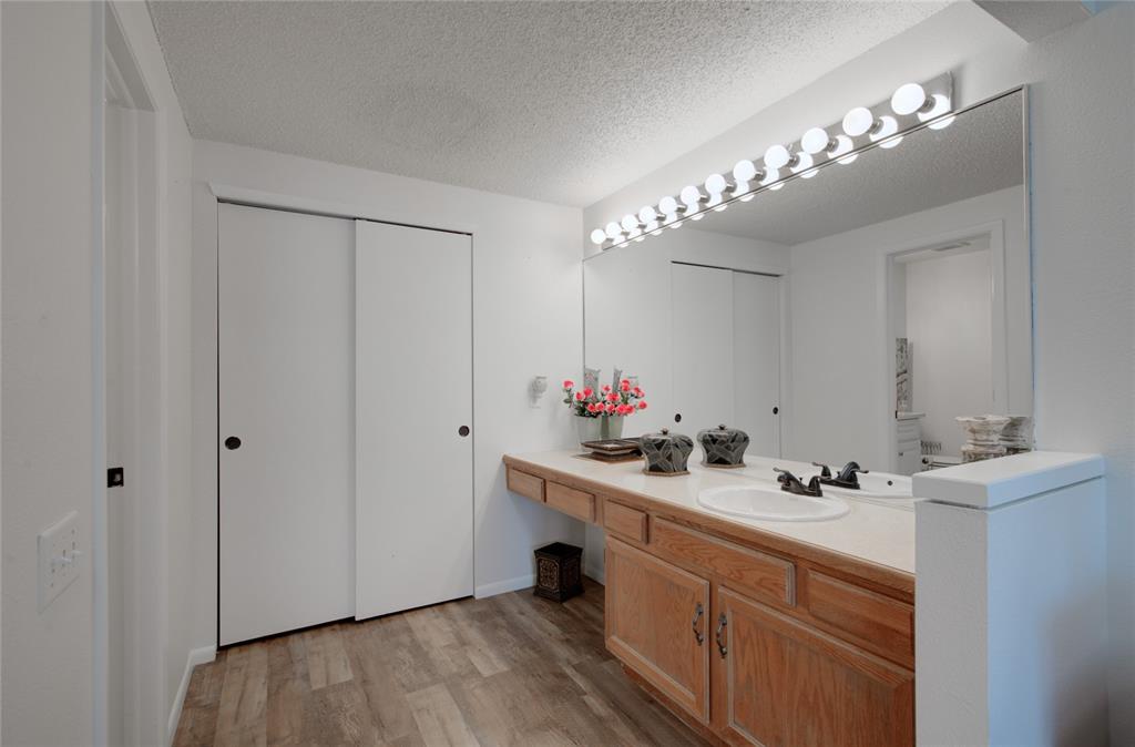 Image 15 of 21: Wood-finish flooring throughout