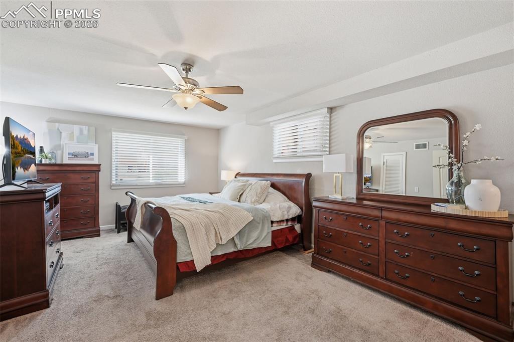 Image 15 of 24: Large Master Bedroom with tons of natural light
