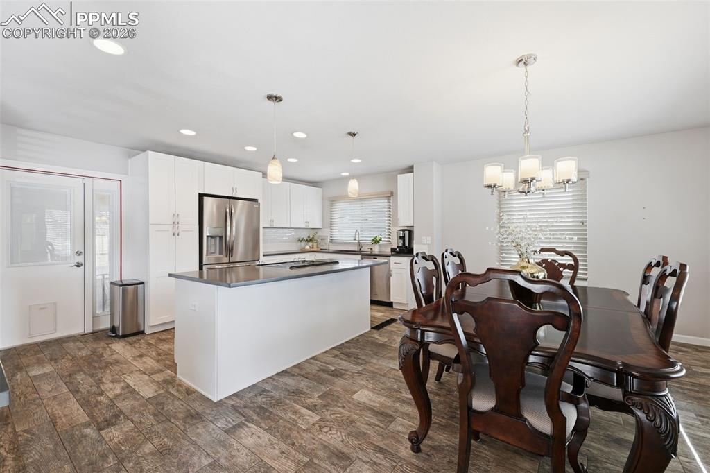 Image 6 of 24: Large kitchen with island and nook area