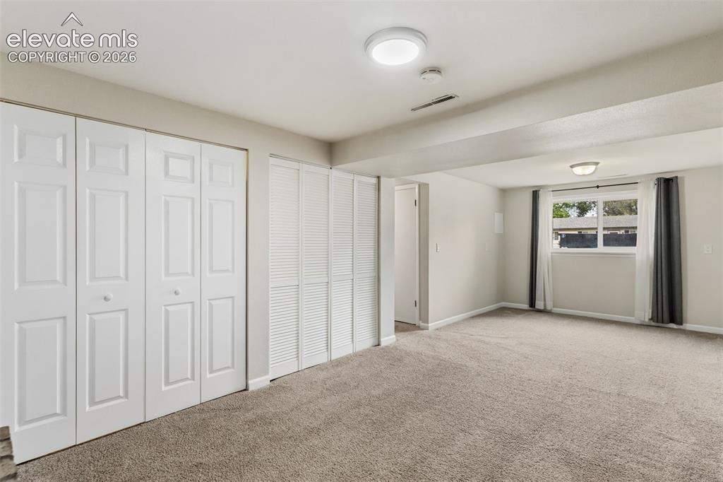 Image 14 of 27: Basement with ample storage