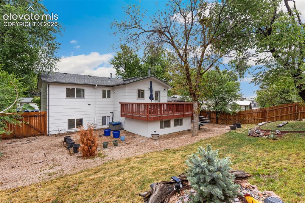 Image 24 of 27: Fenced, landscaped, private backyard