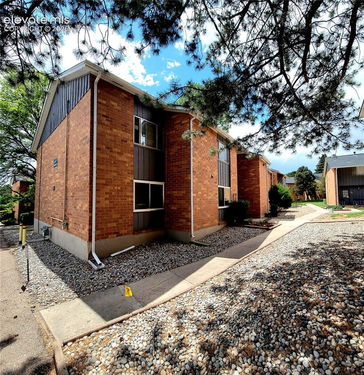Image 1 of 31: Two-story brick building