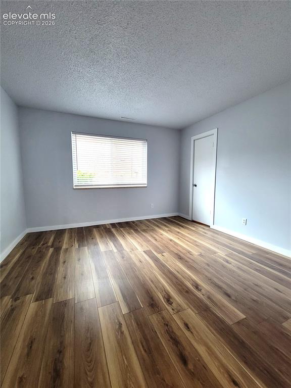 Image 12 of 32: Spacious secondary bedroom featuring walk-in closet