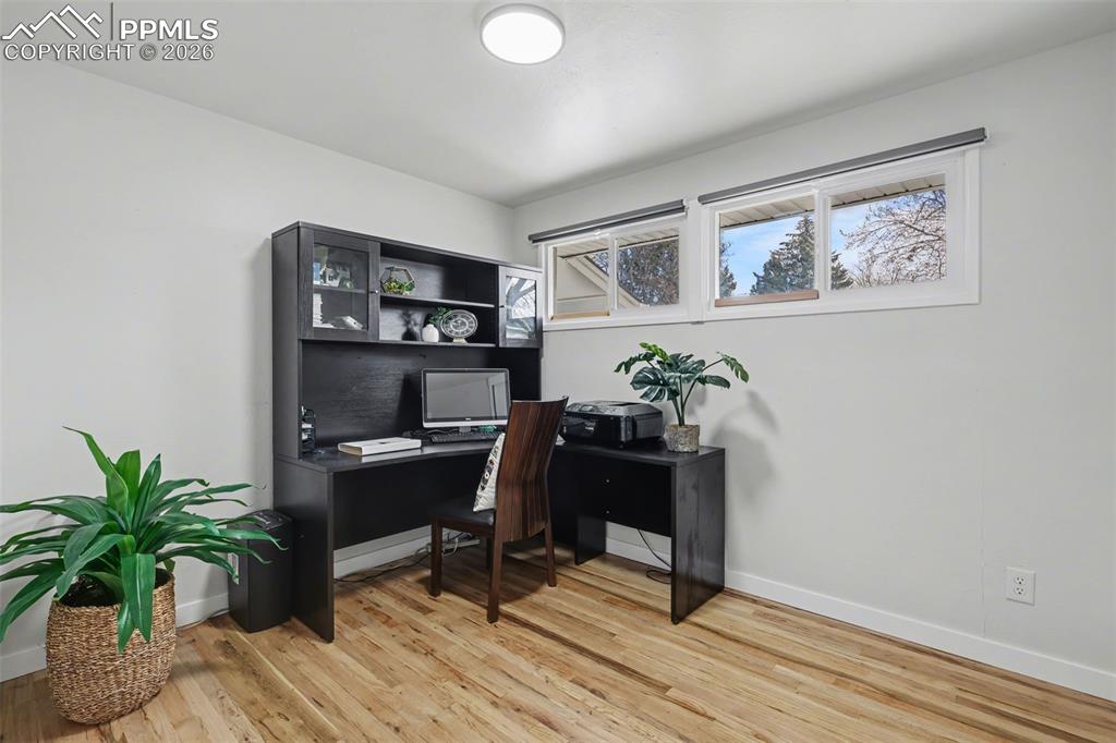 Image 13 of 20: Second bedroom currently being used as office.