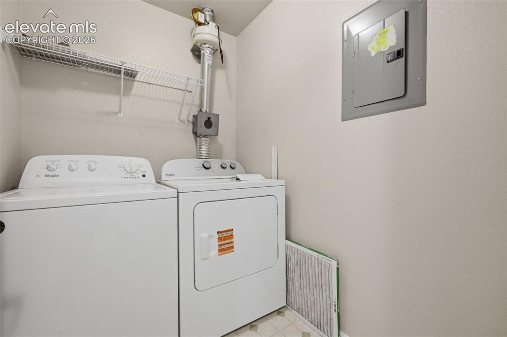 Image 17 of 29: Private Laundry Room. 
