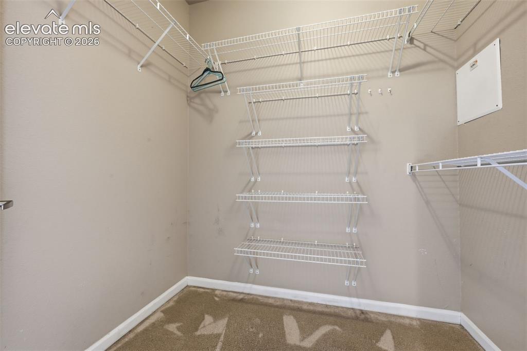 Image 20 of 29: 7.1 x 5.11 Walk-in closet within the primary suite. 