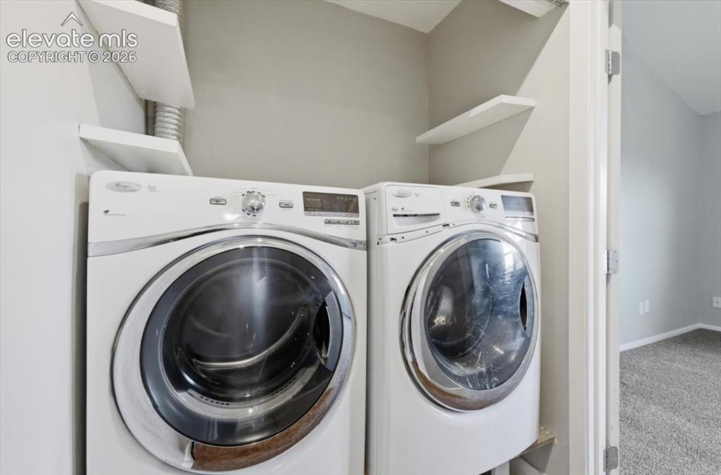 Image 12 of 33: Laundry Room adjoins Primary Suite. Washer & Dryer included!