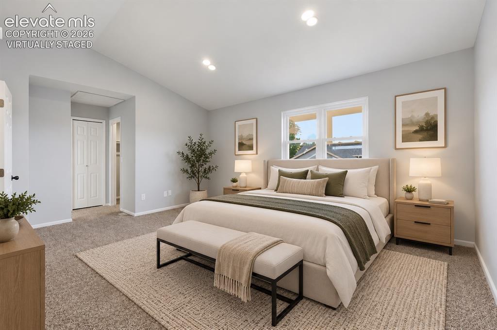 Image 8 of 33: Vaulted Primary Suite with Walk-in Closet! virtually staged 