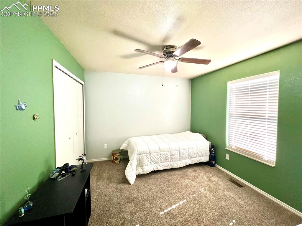 Image 21 of 28: Bedroom