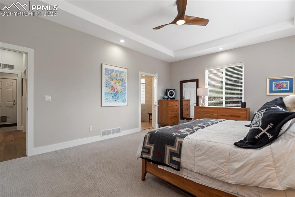 Image 19 of 50: Master bedroom with adjoining 3/4 bathroom