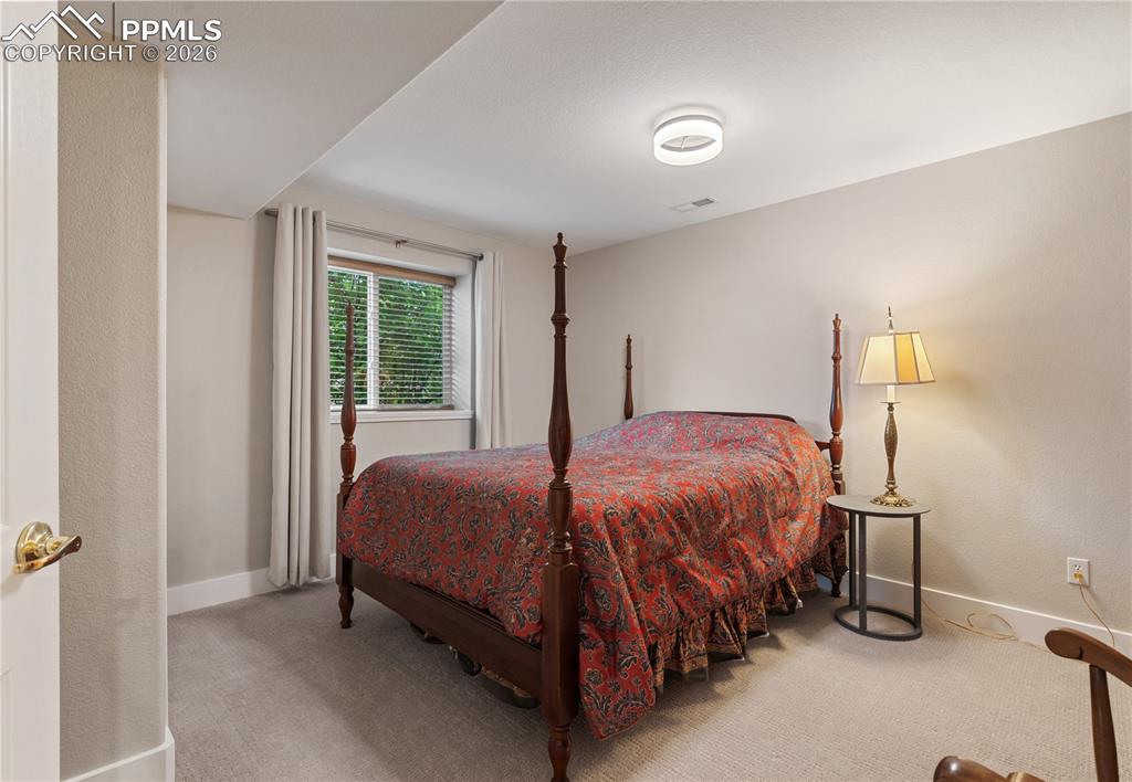 Image 29 of 50: Basement bedroom