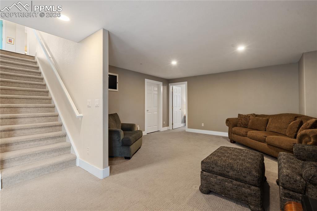 Image 33 of 50: 2nd living room in basement, 10 foot ceiling