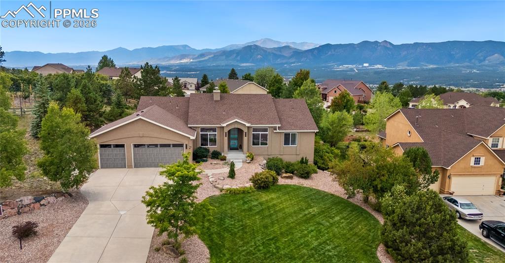 Image 49 of 50: Aerial front view with United States Air Force Academy in the background
