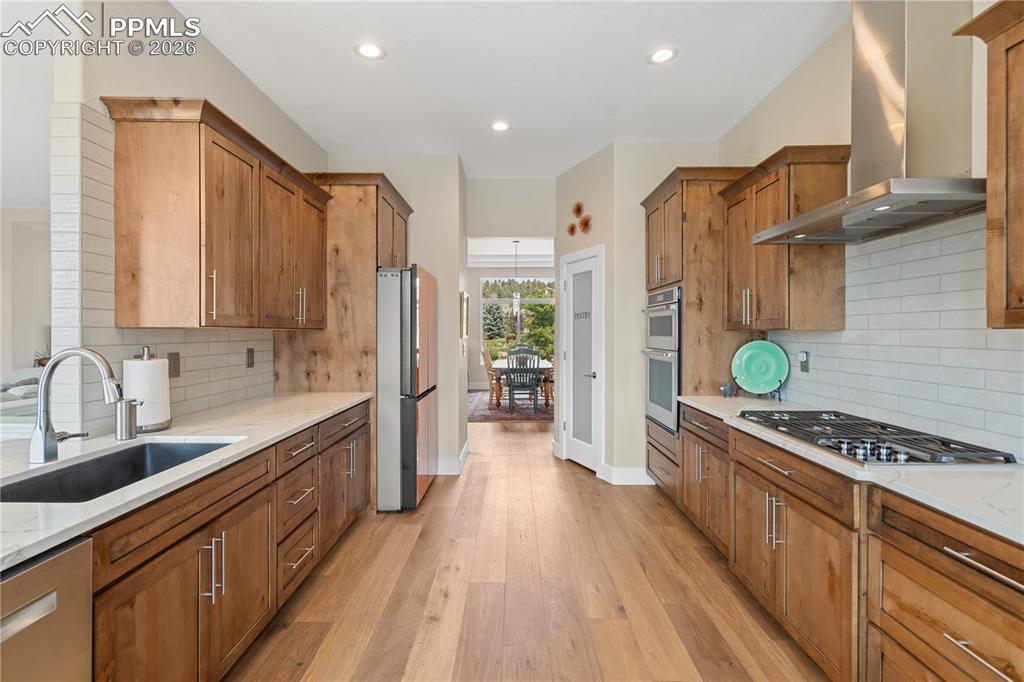 Image 9 of 50: Gourmet kitchen has newer Wolf, Bosch and Kitchen Aid appliances, Kitchen V