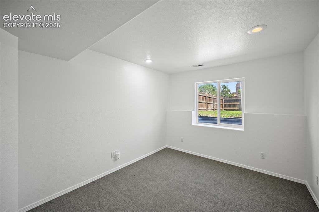 Image 34 of 44: basement/ flex space could be used as bedroom