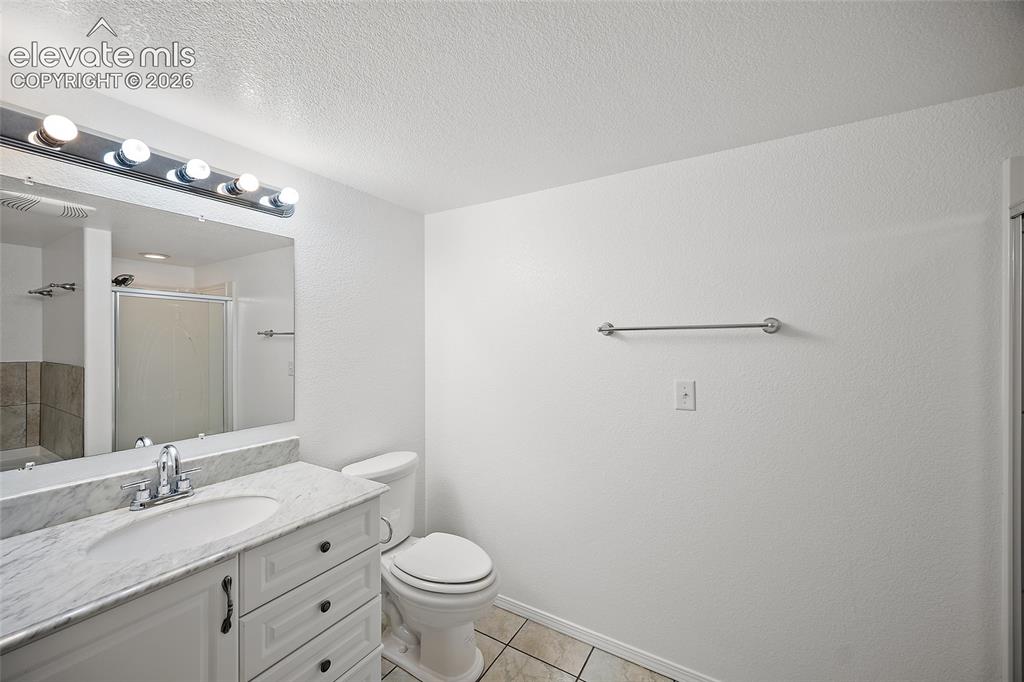 Image 38 of 44: basement bathroom