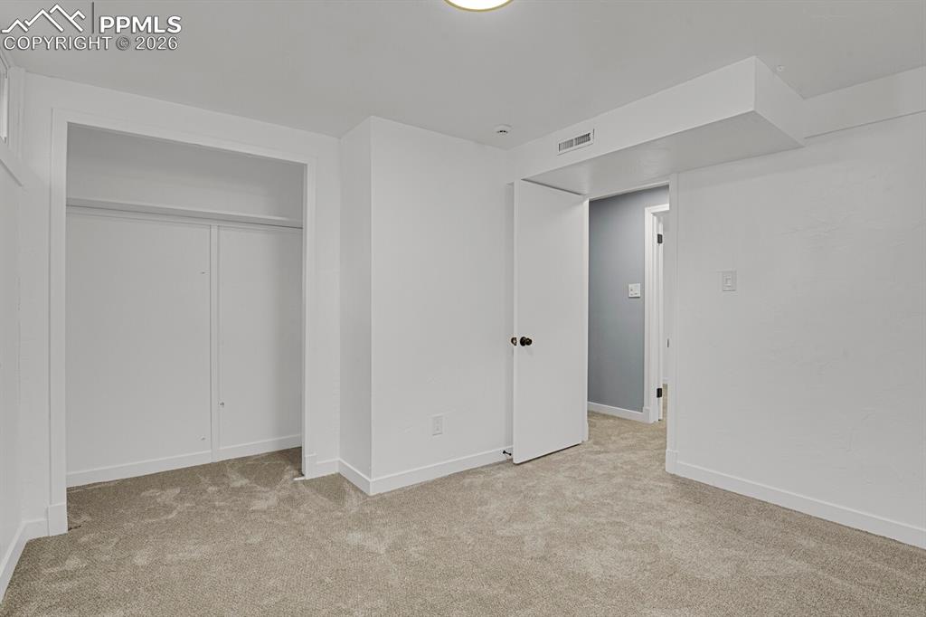 Image 25 of 38: Bedroom