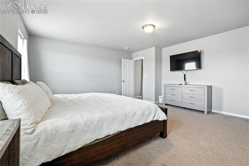 Image 21 of 37: Master Bedroom