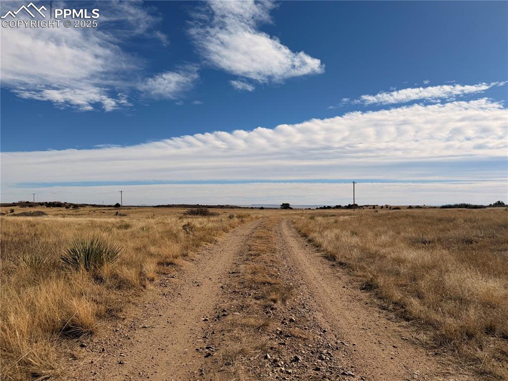 Image 2 of 10: Patsy Cir, dirt road you enter on