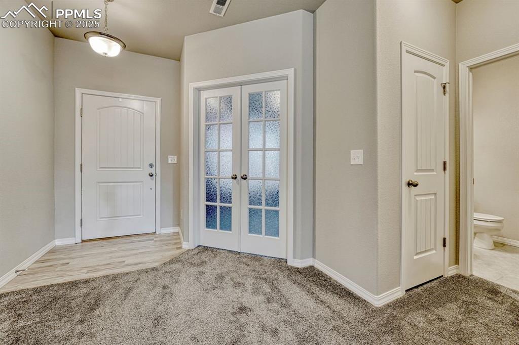 Image 7 of 40: The entry takes you right into the home with easy access to 2 coat closets