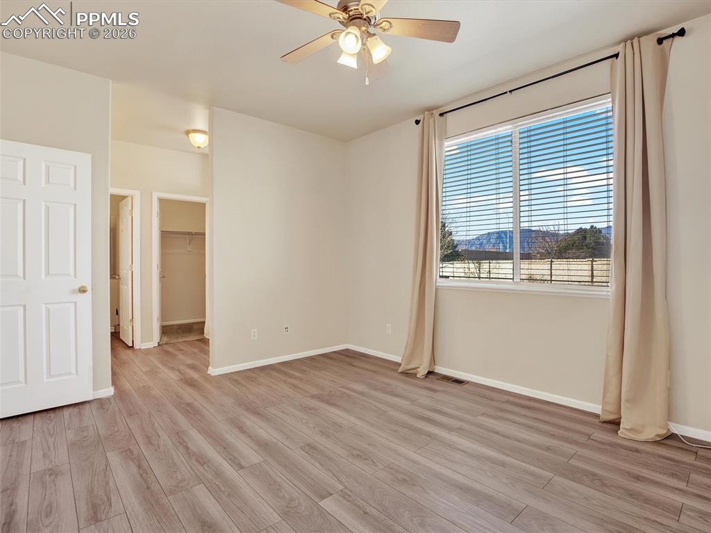 Image 20 of 49: Primary bedroom with mountain views