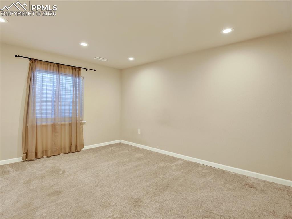 Image 28 of 49: Basement rec room