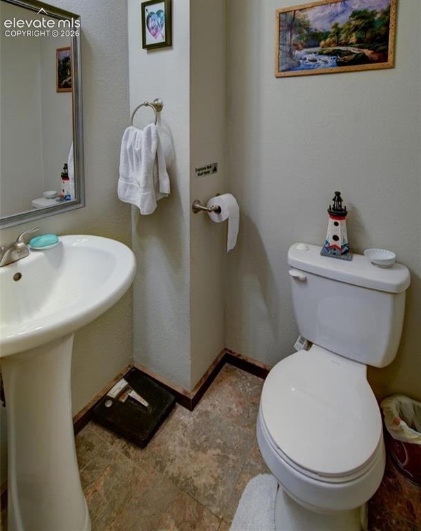 Image 7 of 17: Downstairs half bath