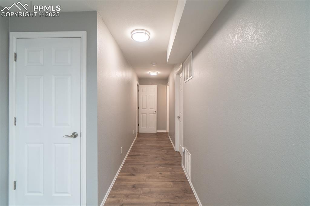 Image 20 of 28: Basement hallway 