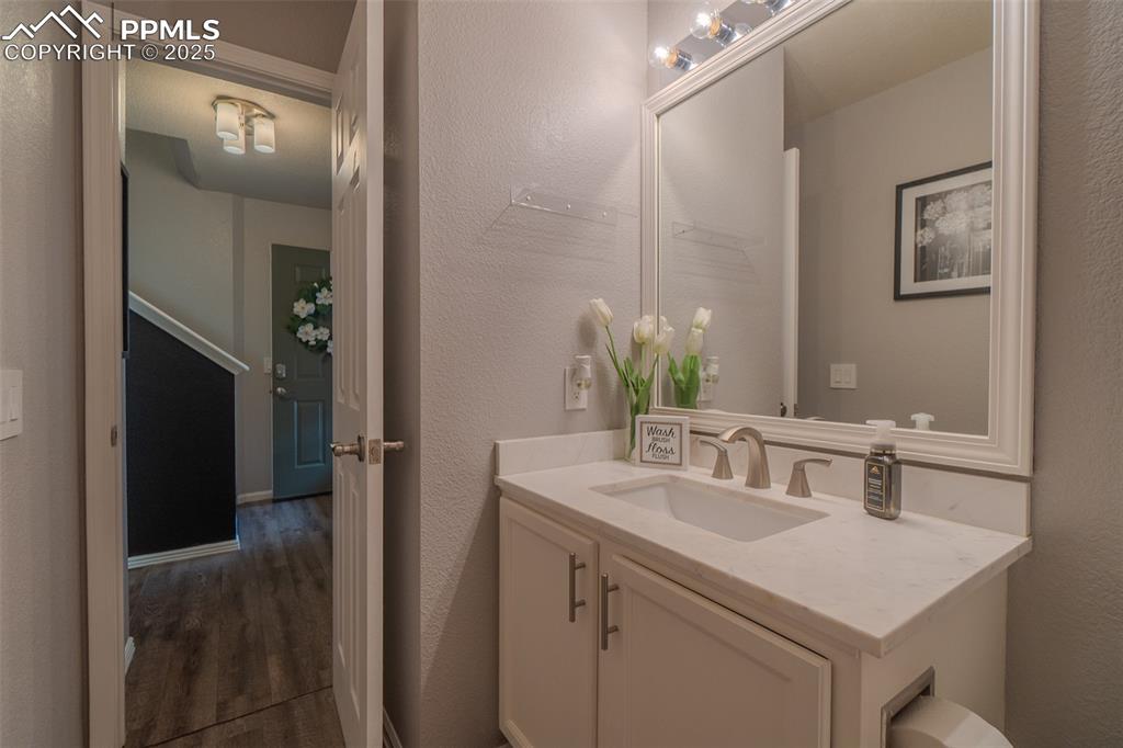 Image 4 of 28: Main level powder room 