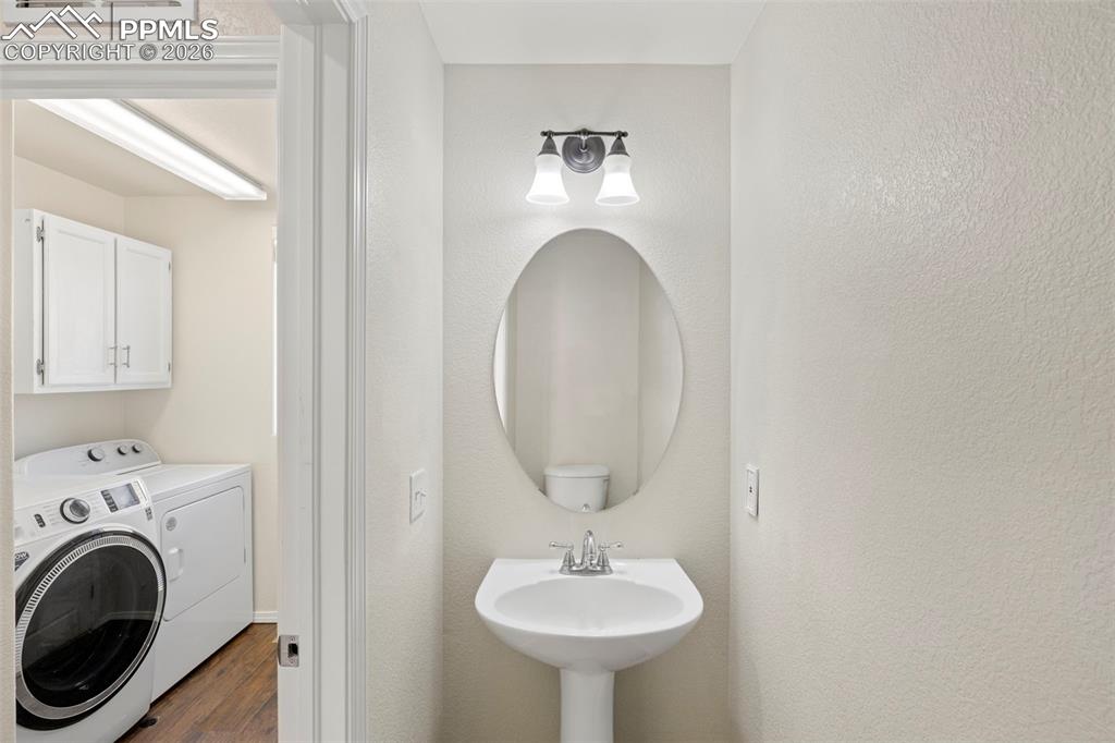 Image 10 of 31: Main level half bath