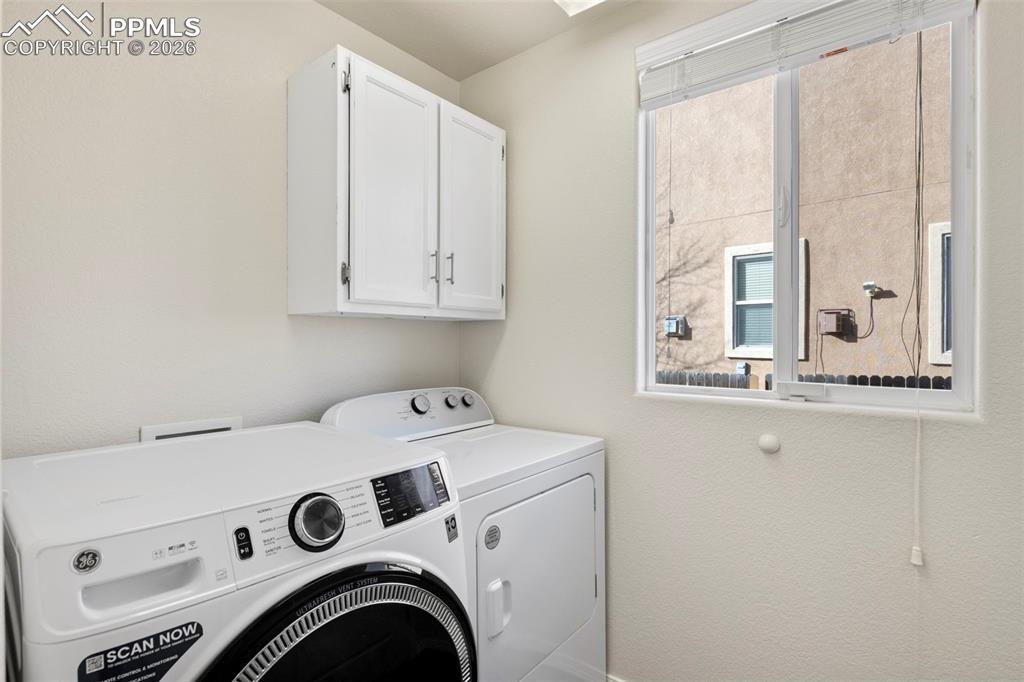 Image 11 of 31: Main level laundry room