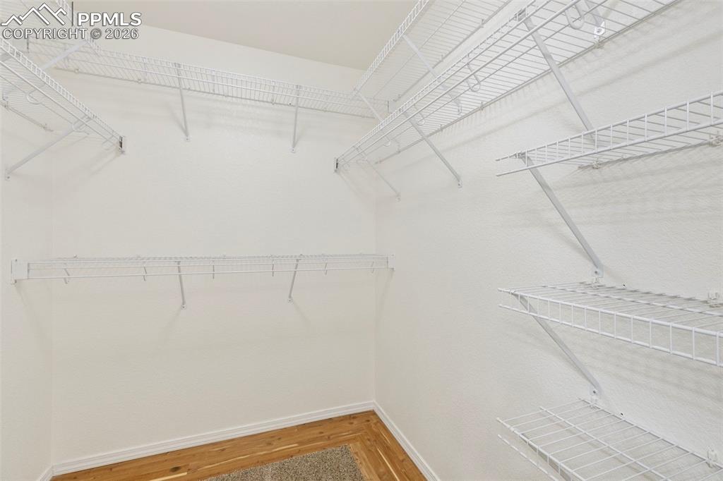 Image 16 of 31: Walk in closet