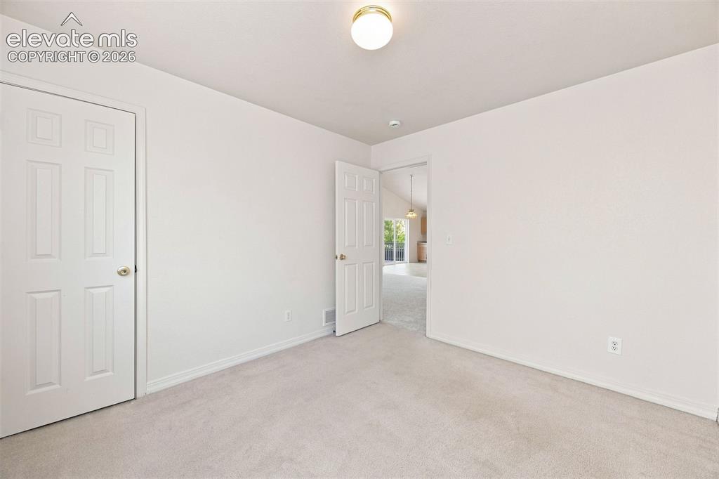 Image 16 of 22: Bedroom